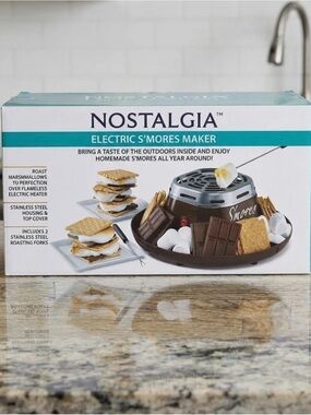 Nostalgia Electric S'mores Maker in brown and teal packaging